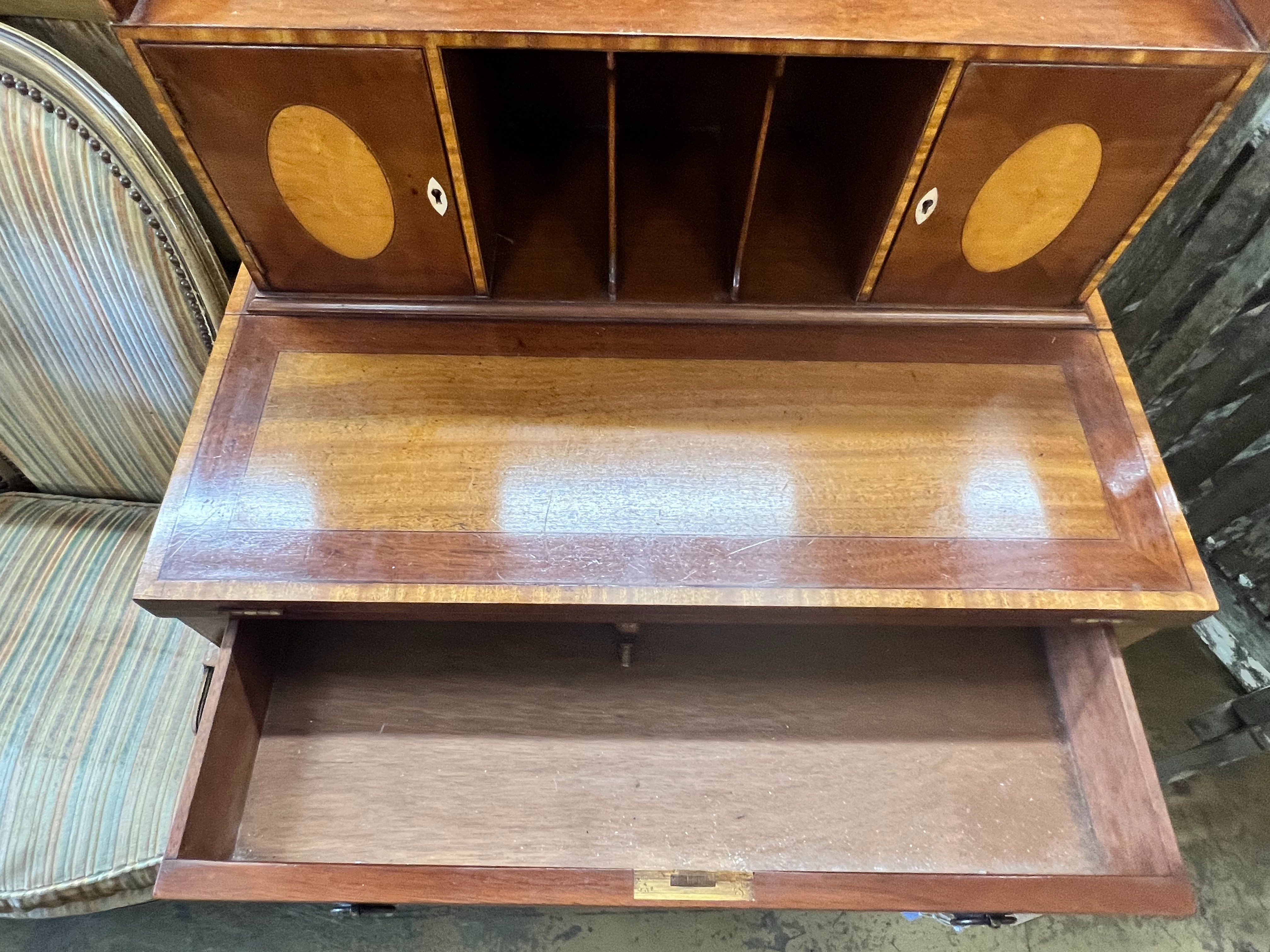 A reproduction Sheraton style crossbanded and satinwood mahogany bonheur du jour, by Arthur Brett, width 63cm depth 43cm height 111cm